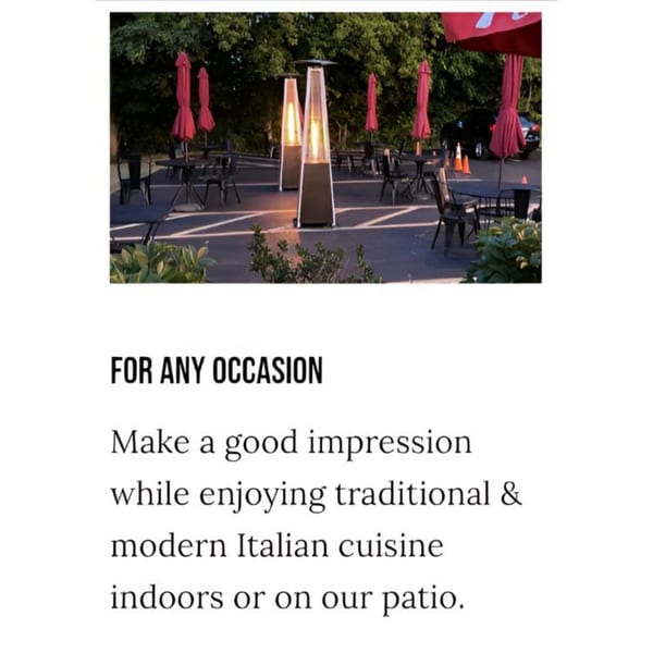 Mona Lisas Ristorante's outdoor patio with tables, chairs, red umbrellas, and two glowing patio heaters.